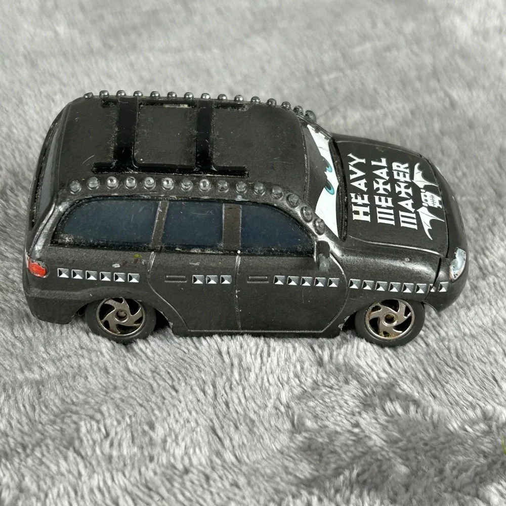 Disney Pixar Cars Heavy Metal Mater Diecast Rocking Rodney Minivan Black Studded